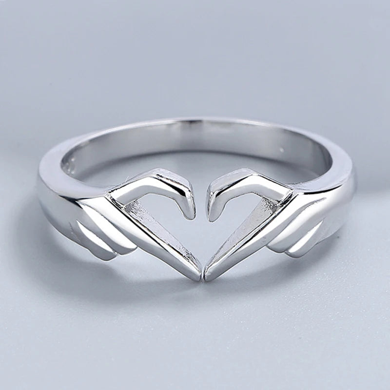 Anillo de dedo con forma de corazon plata - oro