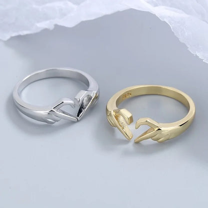 Anillo de dedo con forma de corazon plata - oro